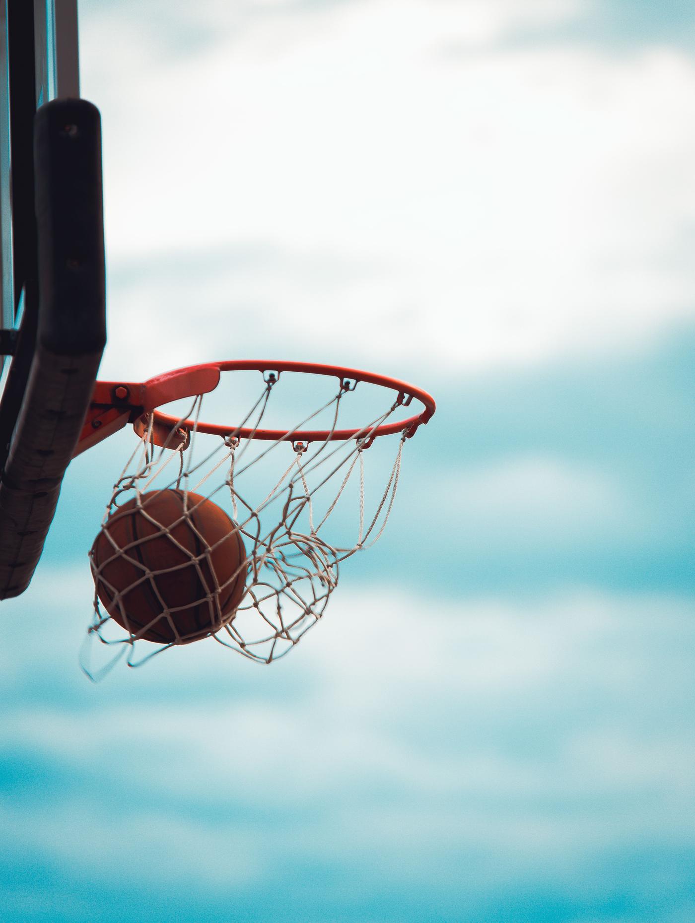 Basketball swishing through the net